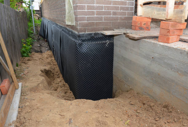 SJ Waterproofing Pros technician performing targeted Exterior Waterproofing assessment in Mount Carmel, IL